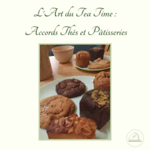 Photographie pour atelier "Accords Thés et Patisseries", on voit plusieurs patisseries sur des assiettes en porcelaine accompagnés d'une théière en fonte et des tasses à thé en porcelaine